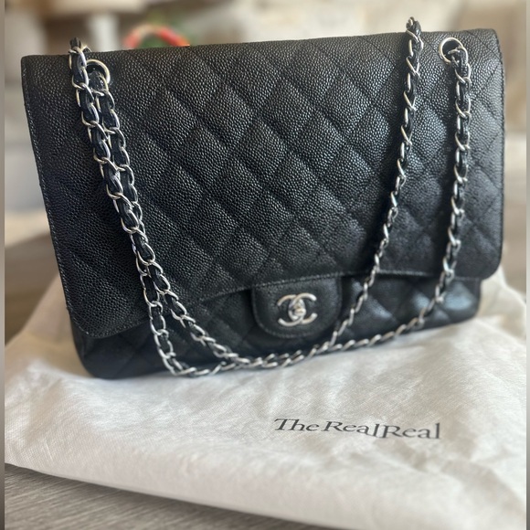 CHANEL Handbags - CHANEL Caviar Black Maxi Double Flap Classic Bag ( interior damage)